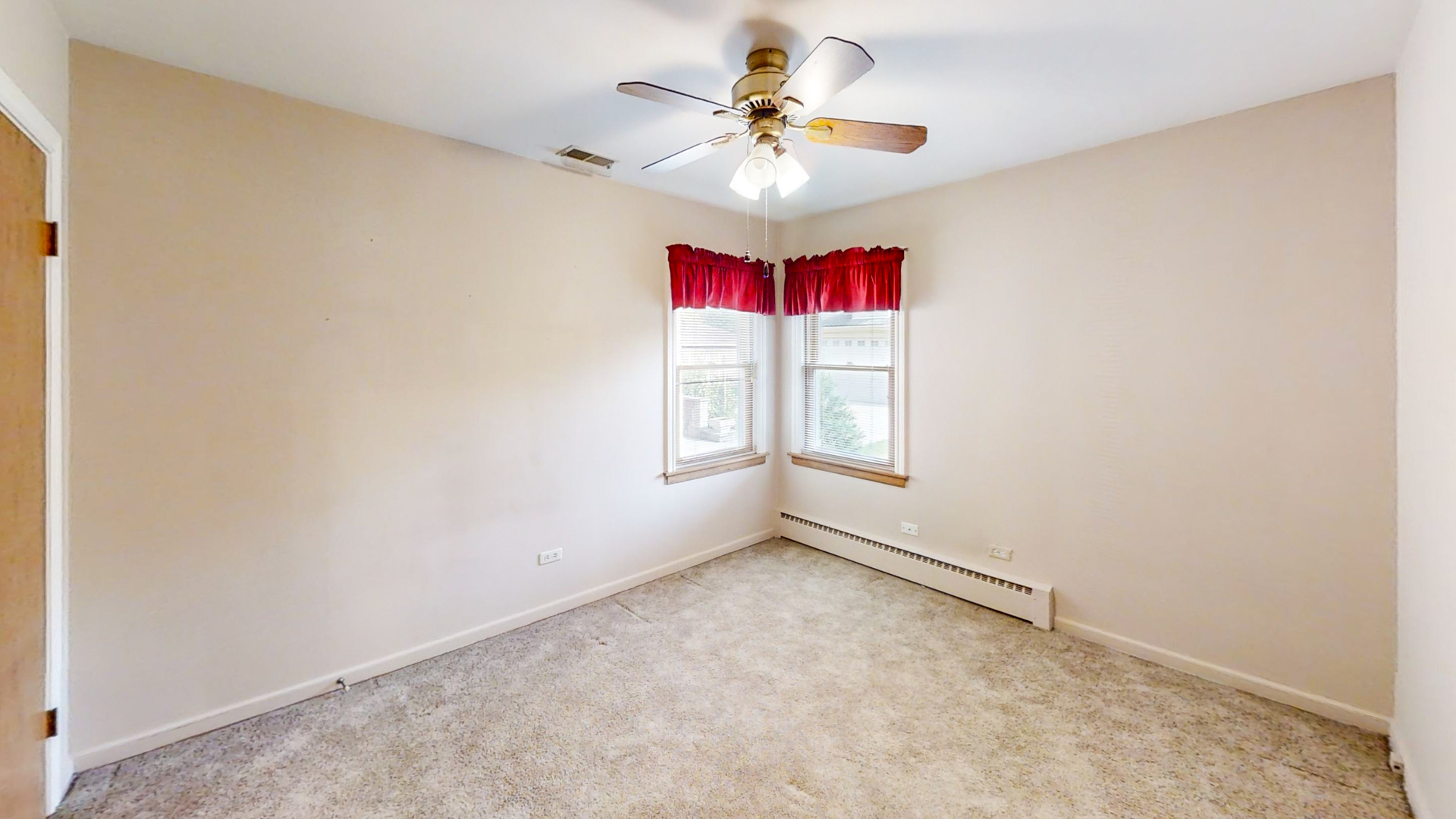 1933 South Crescent Avenue Park Ridge, IL 60068 - Photo 14 of 23 an empty room with windows and chandelier fan