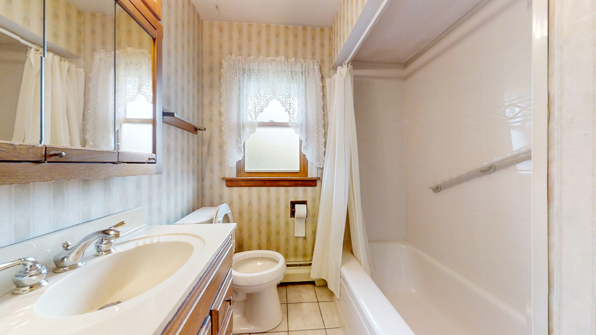 1933 South Crescent Avenue Park Ridge, IL 60068 - Photo 16 of 23 a bathroom with a sink toilet and shower