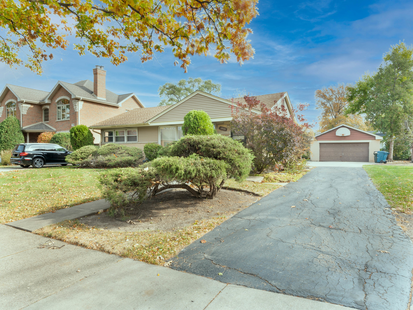 1933 South Crescent Avenue Park Ridge, IL 60068 - Photo 20 of 23 a front view of a house with a yard and garage
