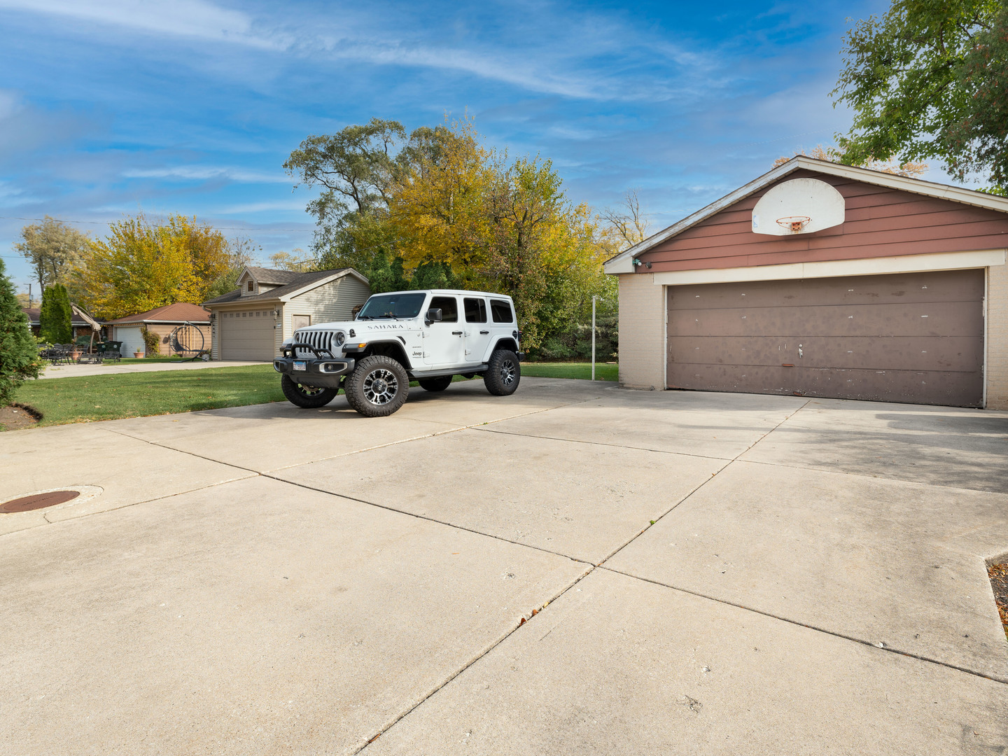 1933 South Crescent Avenue Park Ridge, IL 60068 - Photo 21 of 23 a car parked in front of a house
