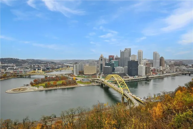 a view of a city with tall buildings