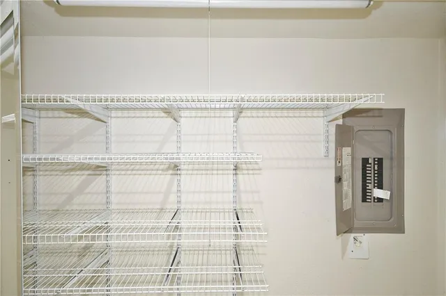 a picture of a bathroom with a shower