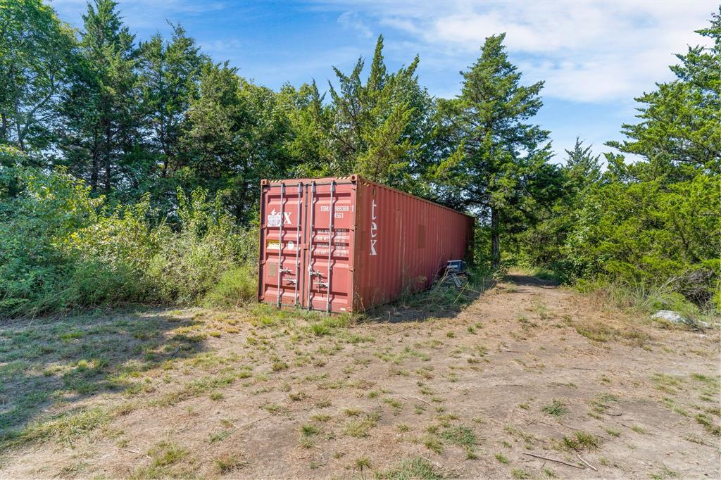 1578 Campground Road Sherman, TX 75090 - Photo 10 of 18 a view of a house with a yard and plant