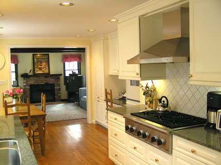 Undisclosed Address Riverside, CT 06878 - Photo 4 of 7 a kitchen with a stove and a refrigerator