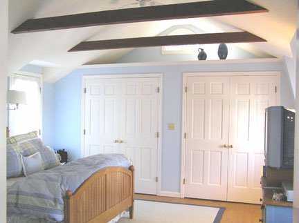 Undisclosed Address Riverside, CT 06878 - Photo 6 of 7 a bedroom with a bed and a flat tv screen