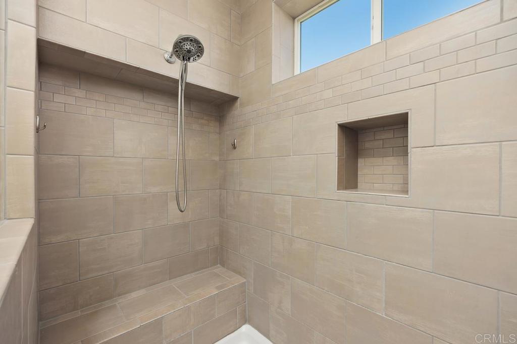 7213 San Luis Street, Unit 171 Carlsbad, CA 92011 - Photo 19 of 44 a bathroom with a shower