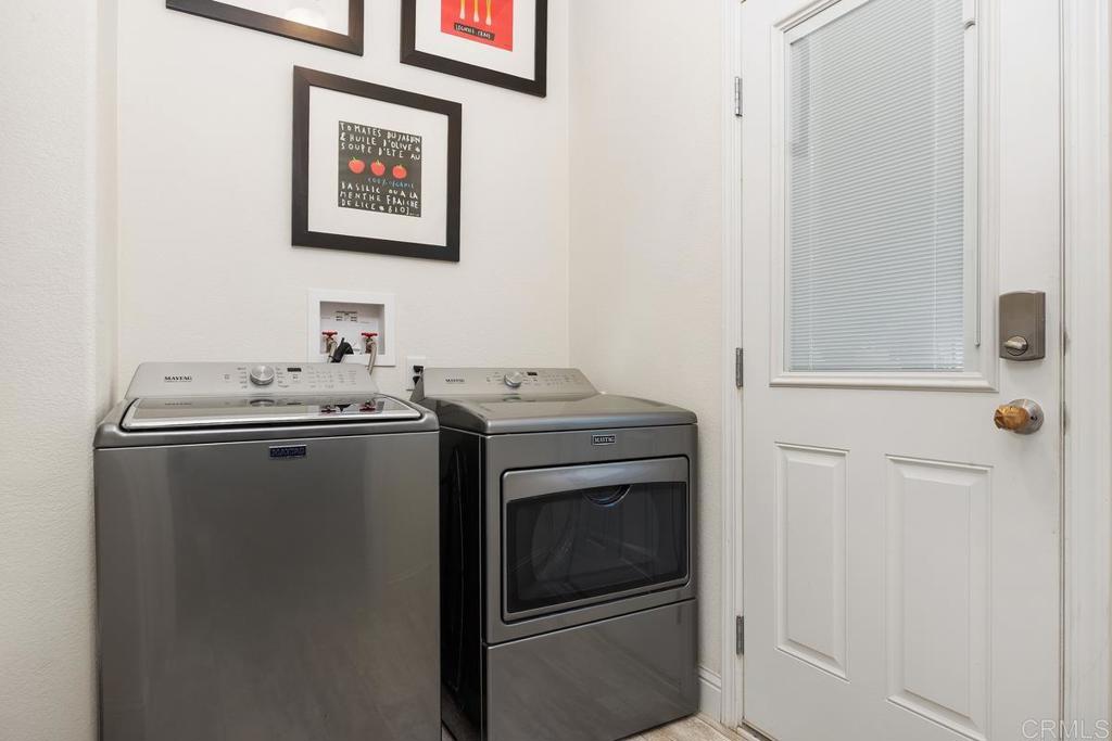 7213 San Luis Street, Unit 171 Carlsbad, CA 92011 - Photo 21 of 44 a utility room with dryer and washer
