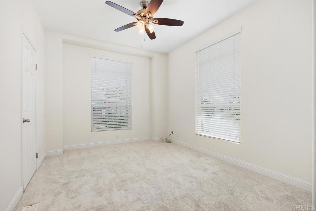 7213 San Luis Street, Unit 171 Carlsbad, CA 92011 - Photo 25 of 44 a view of an empty room with a window