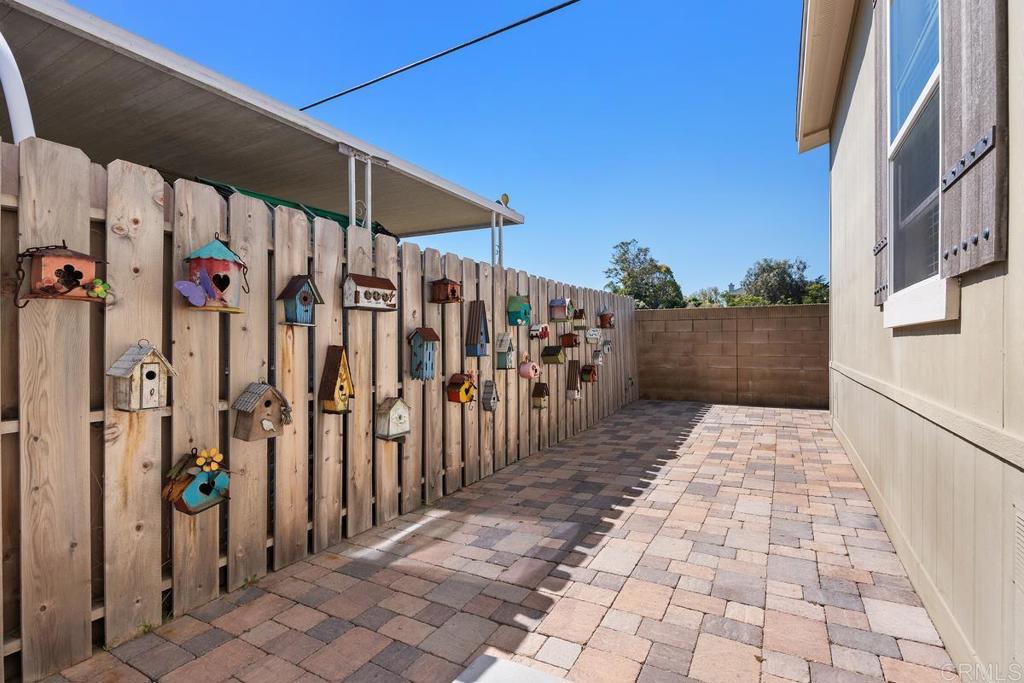 7213 San Luis Street, Unit 171 Carlsbad, CA 92011 - Photo 27 of 44 a view of a pathway with a backyard