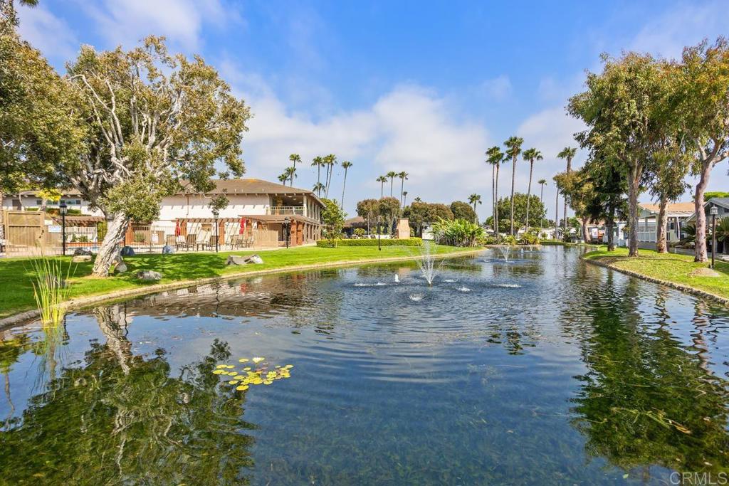 7213 San Luis Street, Unit 171 Carlsbad, CA 92011 - Photo 31 of 44 a view of a lake with houses