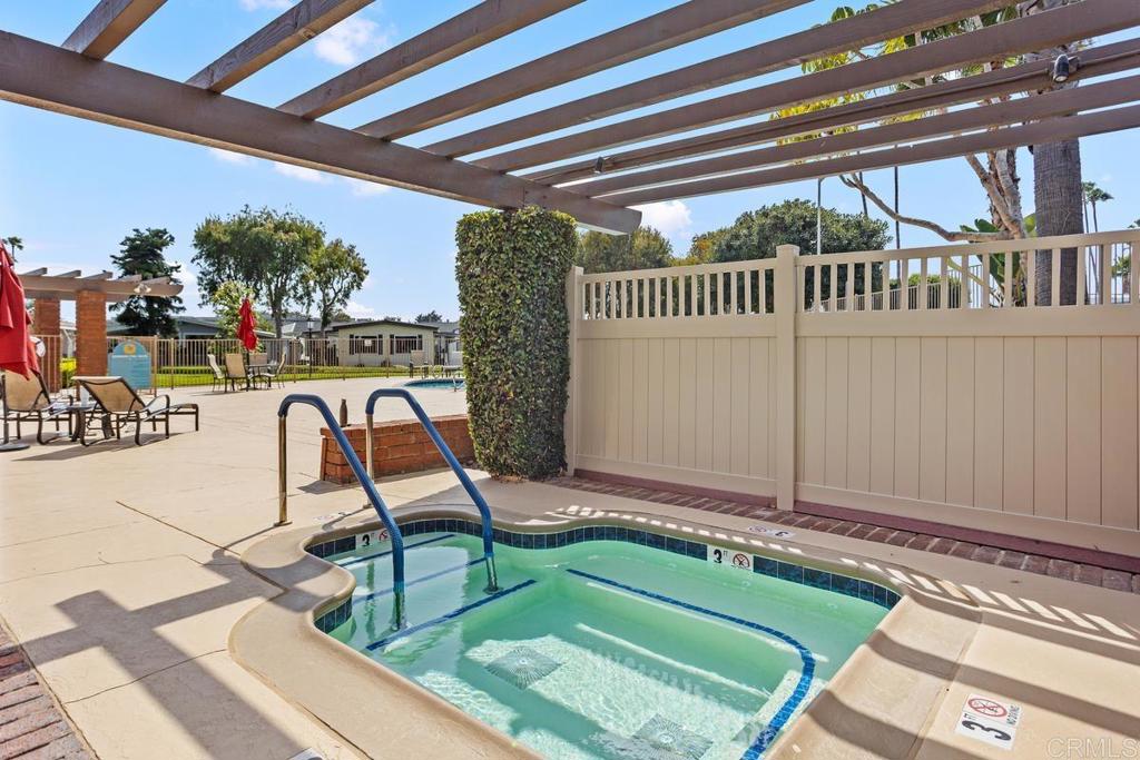7213 San Luis Street, Unit 171 Carlsbad, CA 92011 - Photo 33 of 44 a house view with a seating space