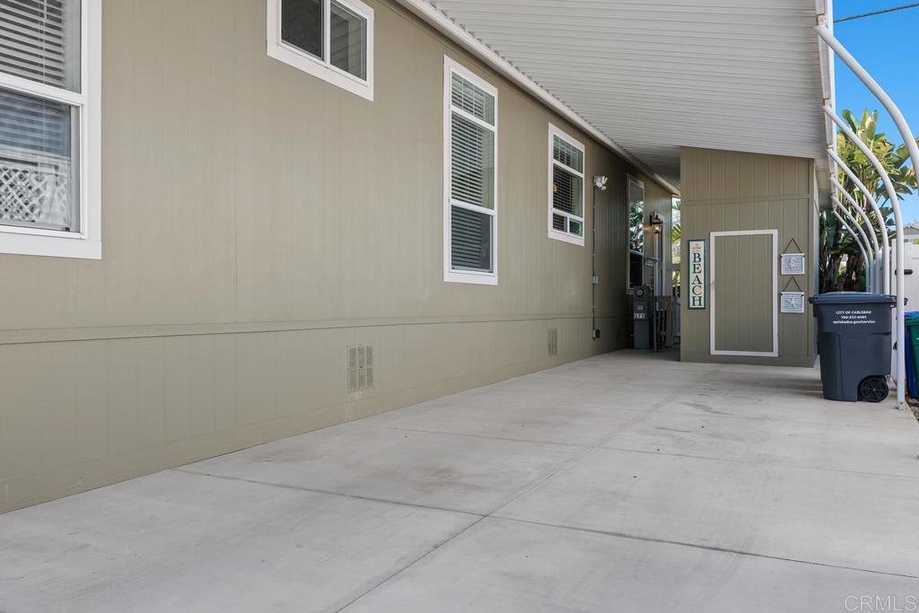 7213 San Luis Street, Unit 171 Carlsbad, CA 92011 - Photo 6 of 44 a view of an empty room with a window