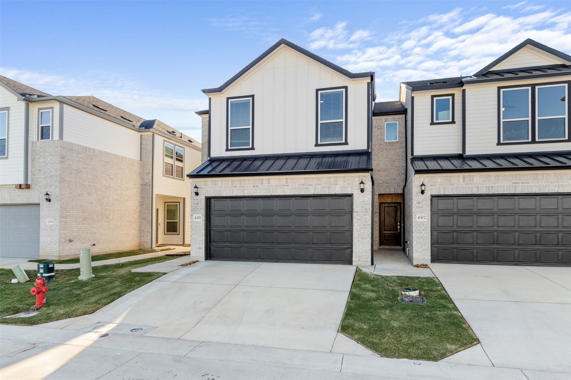 1955 Settlers Glen Drive, Unit 4301 Round Rock, TX 78665 - Photo 1 of 19 a front view of a house with a garage