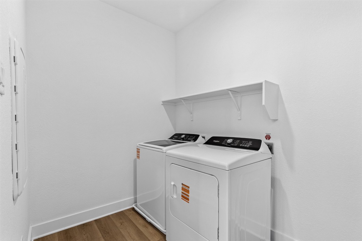 1955 Settlers Glen Drive, Unit 4301 Round Rock, TX 78665 - Photo 12 of 19 a utility room with dryer and washer
