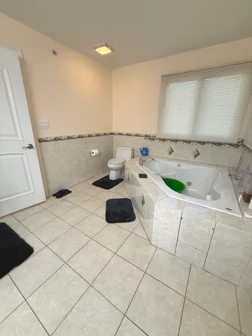 a bathroom with a sink and a bathtub