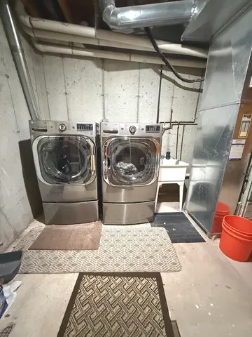 a bathroom with a sink and mirror