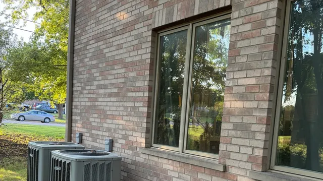a view of a door and chair in the room