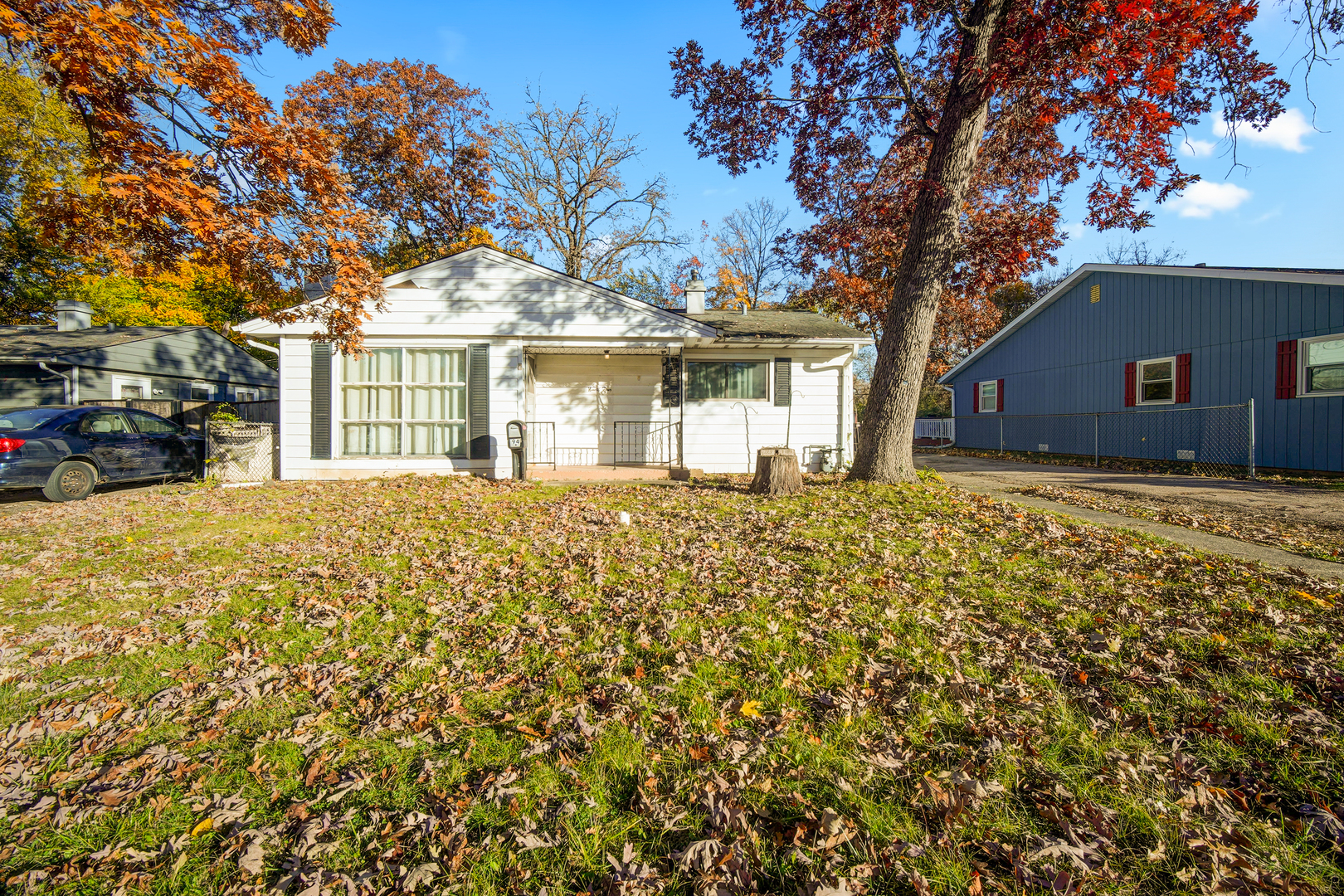 94 Wren Road Carpentersville, IL 60110 - Photo 3 of 21 front view of a house with a large tree