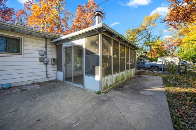 a kitchen with stainless steel appliances granite countertop a stove a sink dishwasher and a refrigerator