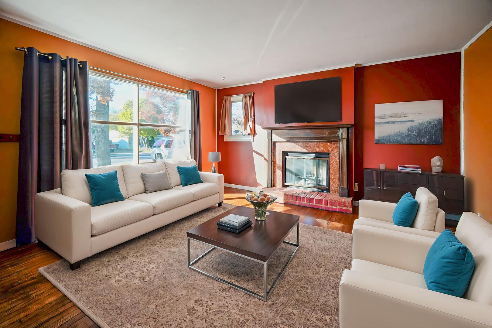 94 Wren Road Carpentersville, IL 60110 - Photo 9 of 21 a living room with fireplace furniture and a large window