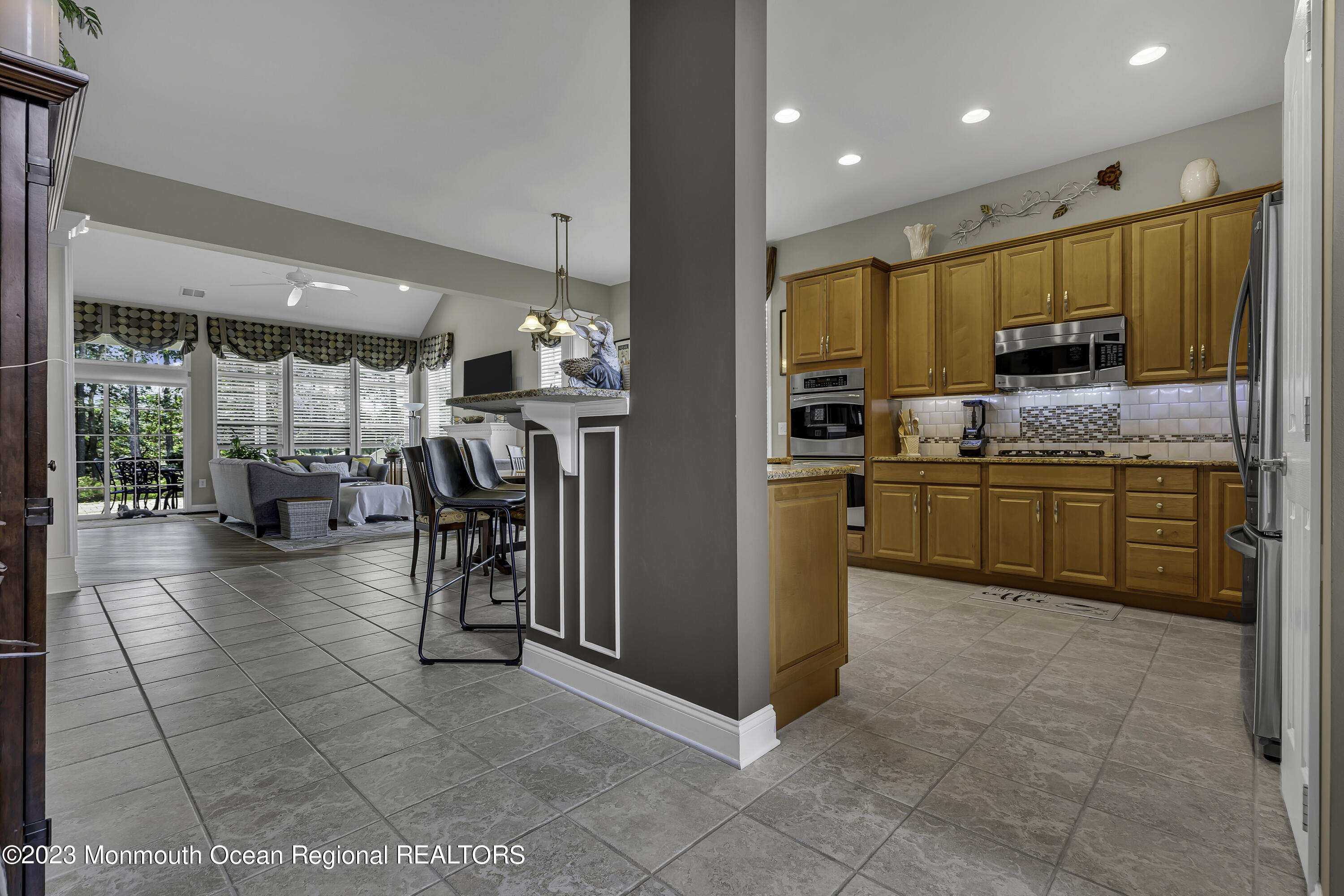 63 Harvey Cedar Way Waretown, NJ 08758 - Photo 11 of 39 a kitchen with stainless steel appliances granite countertop a refrigerator and a sink
