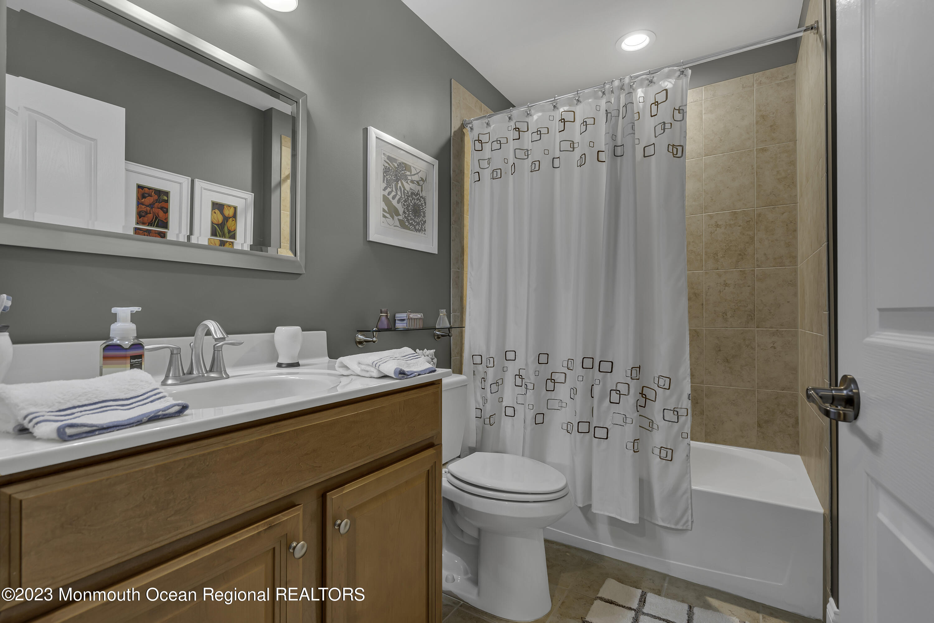 63 Harvey Cedar Way Waretown, NJ 08758 - Photo 33 of 39 a bathroom with a sink a toilet and shower