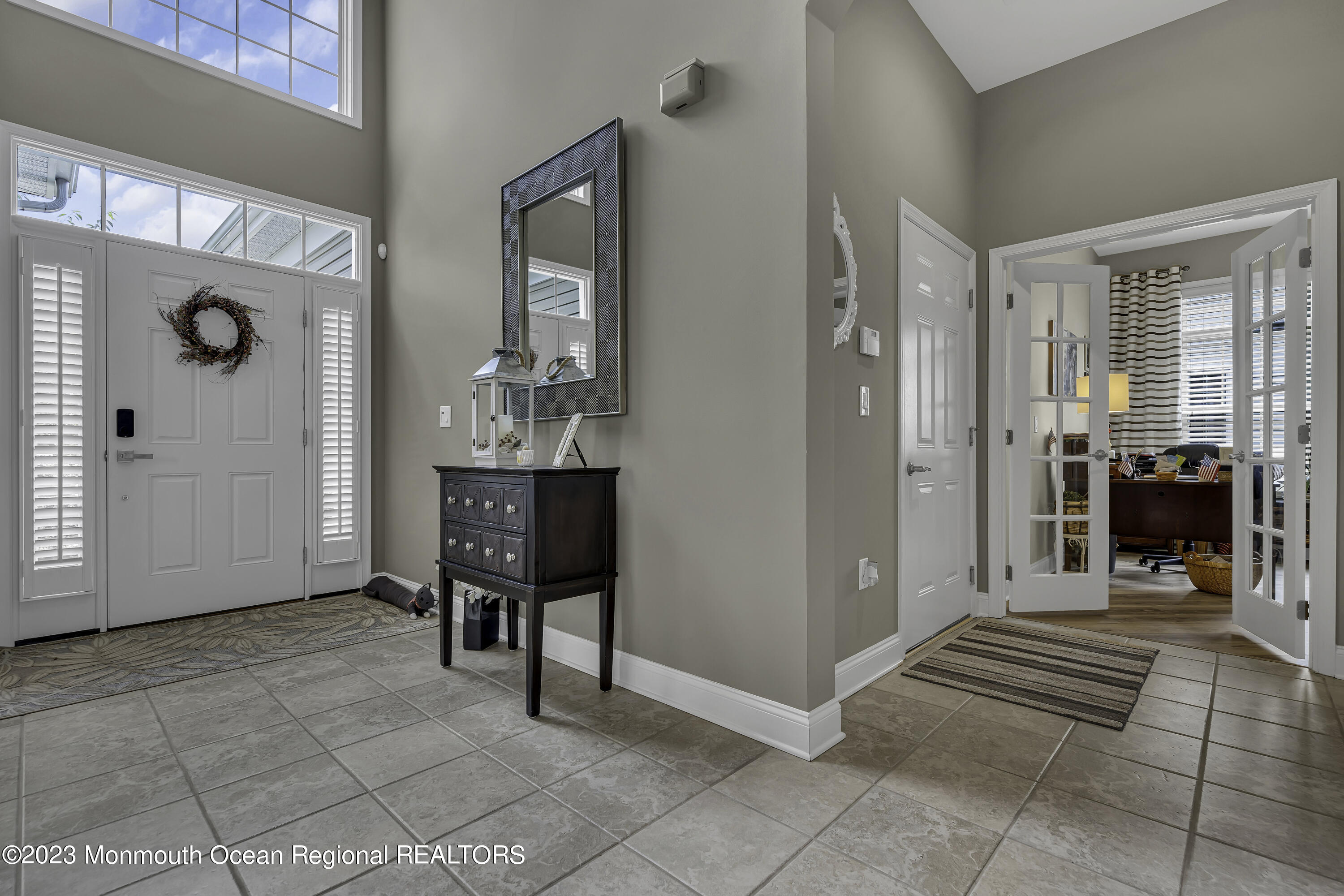 63 Harvey Cedar Way Waretown, NJ 08758 - Photo 6 of 39 a view of an entryway with a livingroom