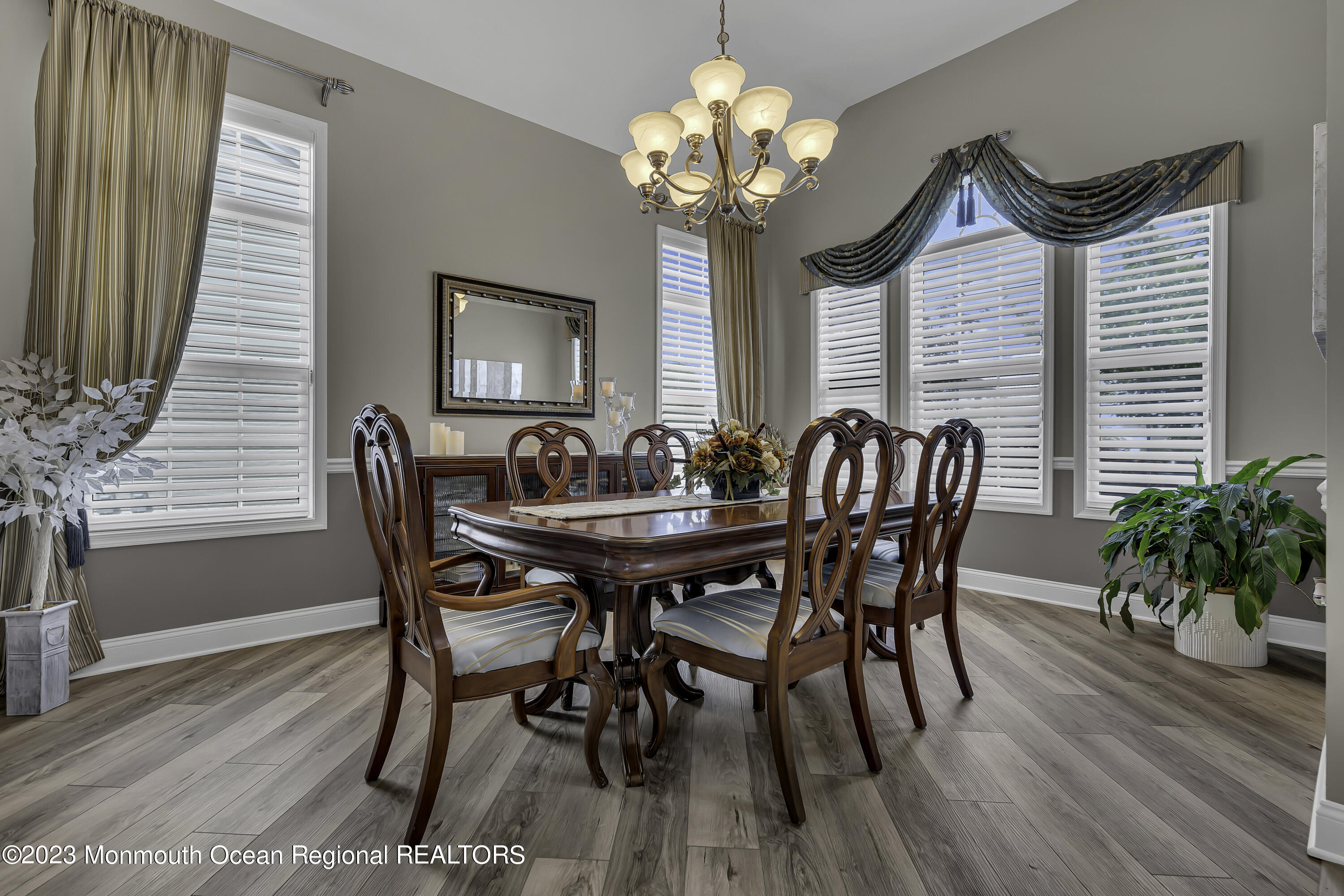 63 Harvey Cedar Way Waretown, NJ 08758 - Photo 9 of 39 a view of a dining room with furniture window and wooden floor
