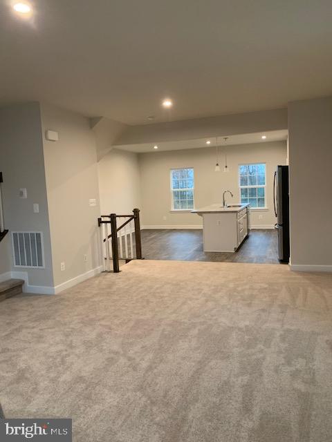 1926 Spearfish Court Newark, DE 19702 - Photo 17 of 25 a view of a kitchen with a sink and a refrigerator