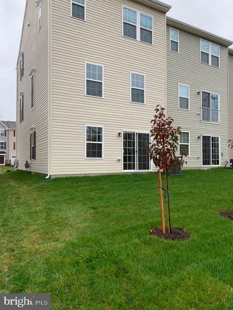 1926 Spearfish Court Newark, DE 19702 - Photo 2 of 25 a house with a tree in front of it