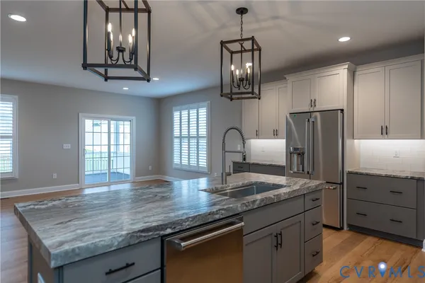 a kitchen with counter space cabinets and appliances