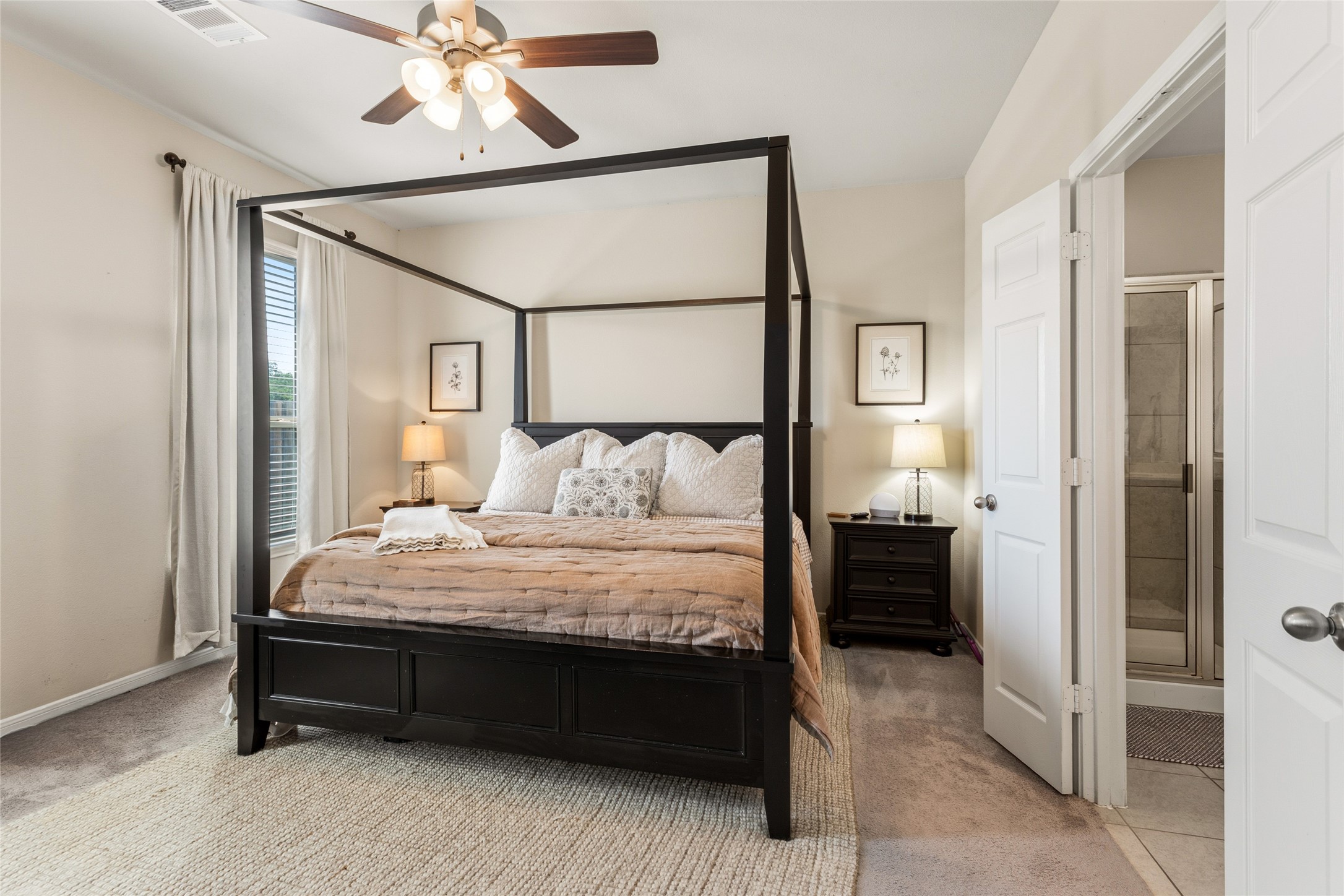 7254 Victorville Drive Rosharon, TX 77583 - Photo 8 of 27 a bedroom with a bed and a chandelier