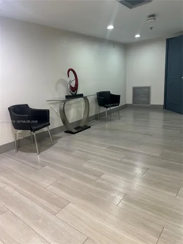 a room with lots of table and chairs