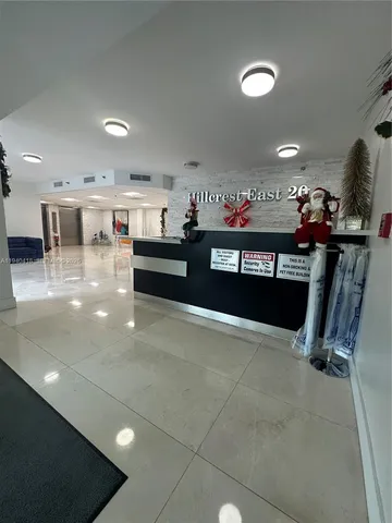 a view of swimming pool with a yard