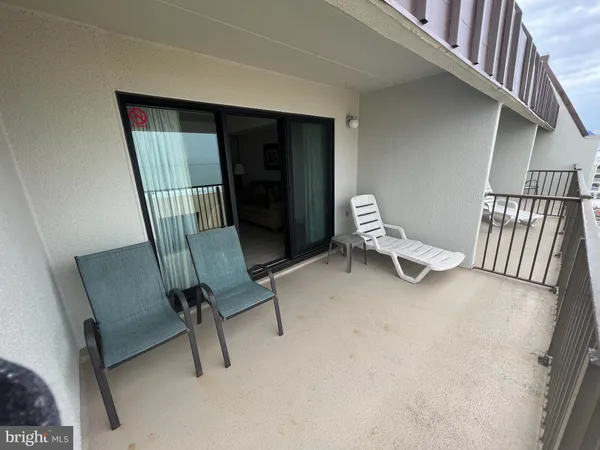 a view of a balcony with an outdoor space