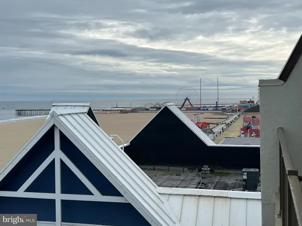 a view of a balcony with an ocean