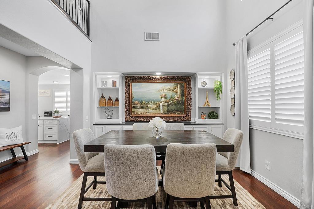 1777 Clover Tree Court Chula Vista, CA 91913 - Photo 11 of 49 a dining room with furniture a rug and wooden floor