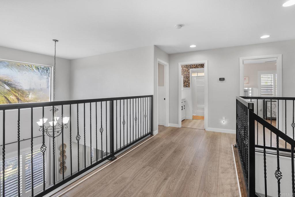1777 Clover Tree Court Chula Vista, CA 91913 - Photo 17 of 49 a view of a hallway with wooden floor and staircase