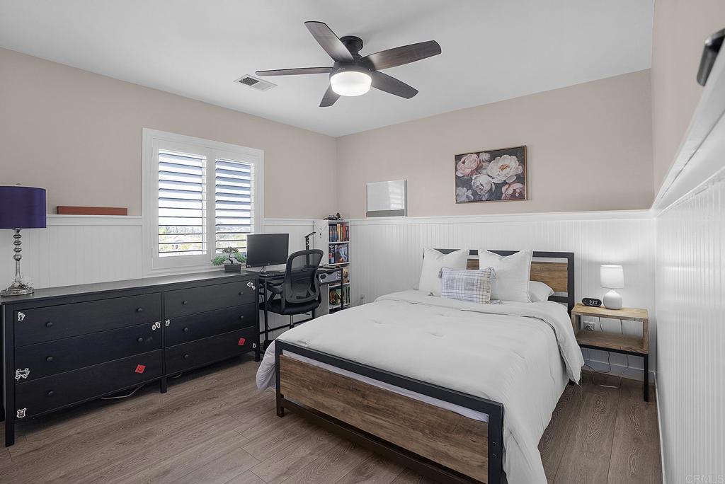 1777 Clover Tree Court Chula Vista, CA 91913 - Photo 26 of 49 a bedroom with a bed and a table