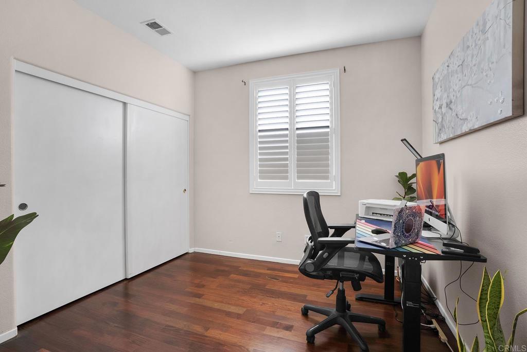 1777 Clover Tree Court Chula Vista, CA 91913 - Photo 29 of 49 a view of a workspace with furniture and a window