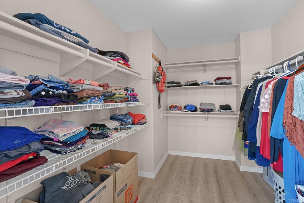 1777 Clover Tree Court Chula Vista, CA 91913 - Photo 37 of 49 a view of walk in closet with clothes and shoes