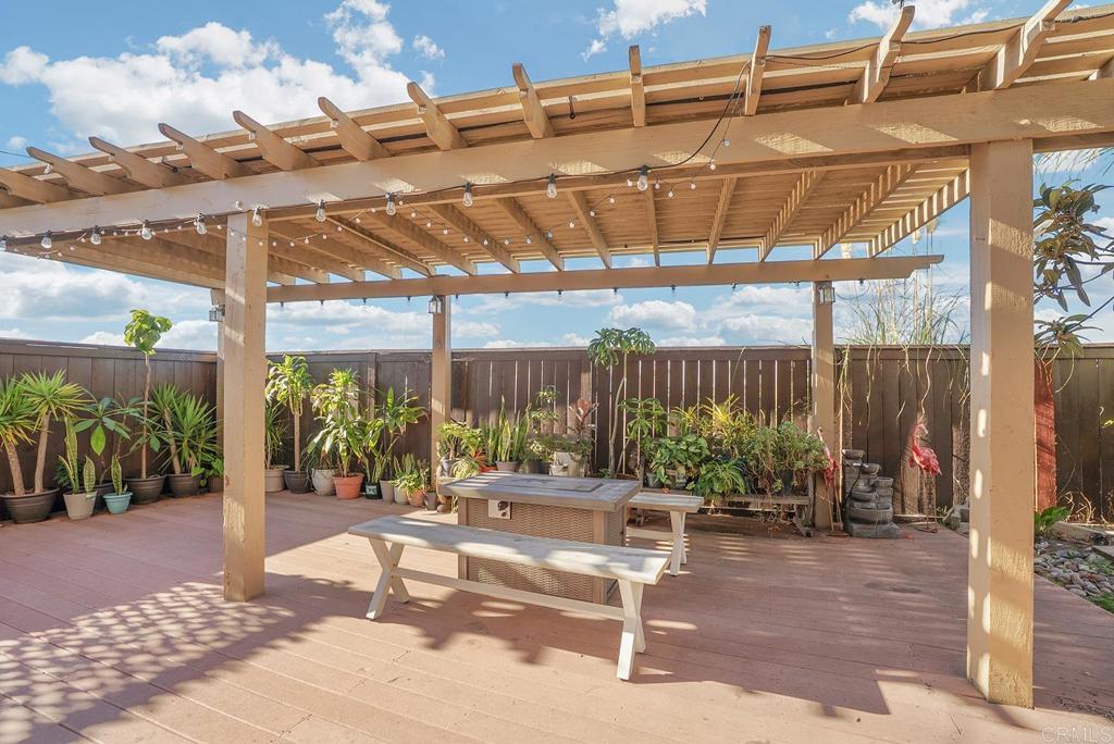 1777 Clover Tree Court Chula Vista, CA 91913 - Photo 40 of 49 a patio with glass top table and chairs