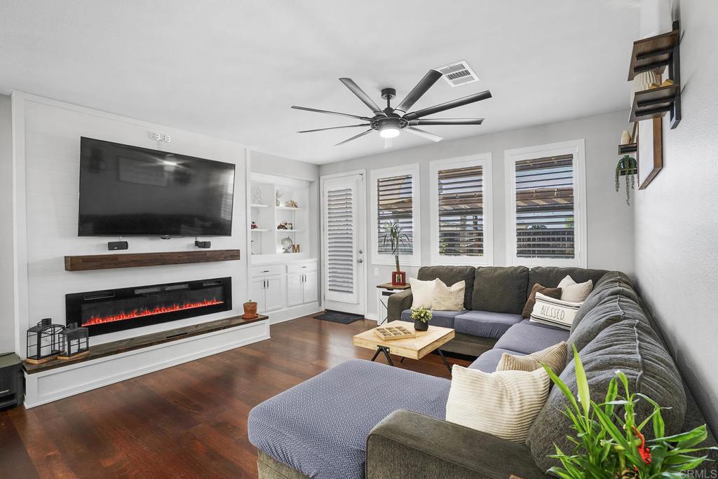 1777 Clover Tree Court Chula Vista, CA 91913 - Photo 4 of 49 a living room with furniture and a flat screen tv