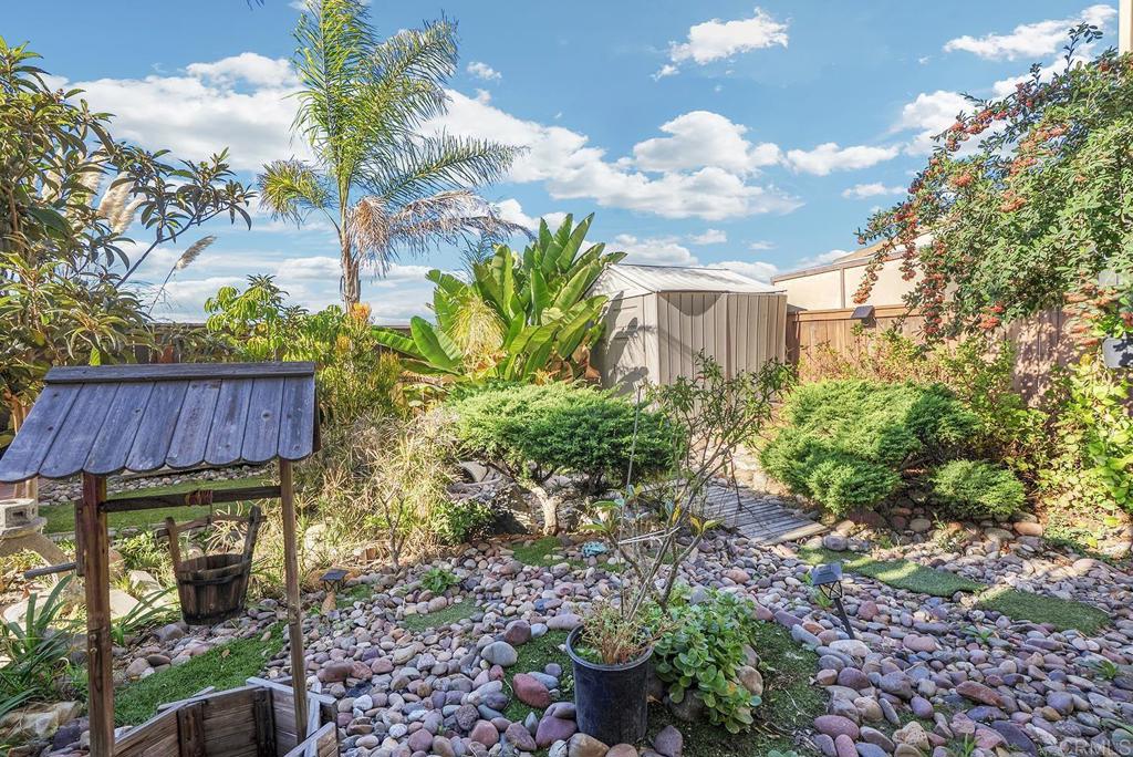 1777 Clover Tree Court Chula Vista, CA 91913 - Photo 43 of 49 a view of a house with a flower garden