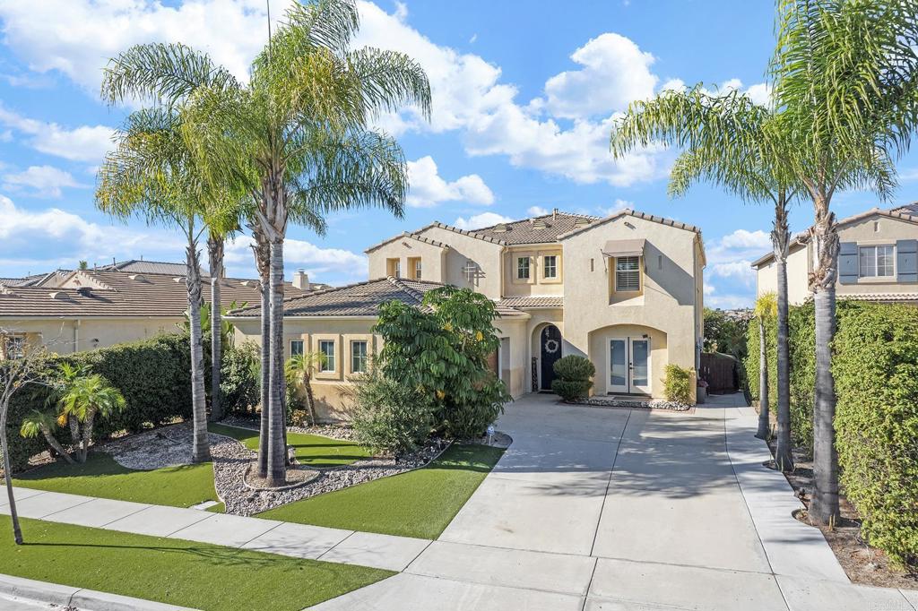 1777 Clover Tree Court Chula Vista, CA 91913 - Photo 48 of 49 a front view of a house with garden