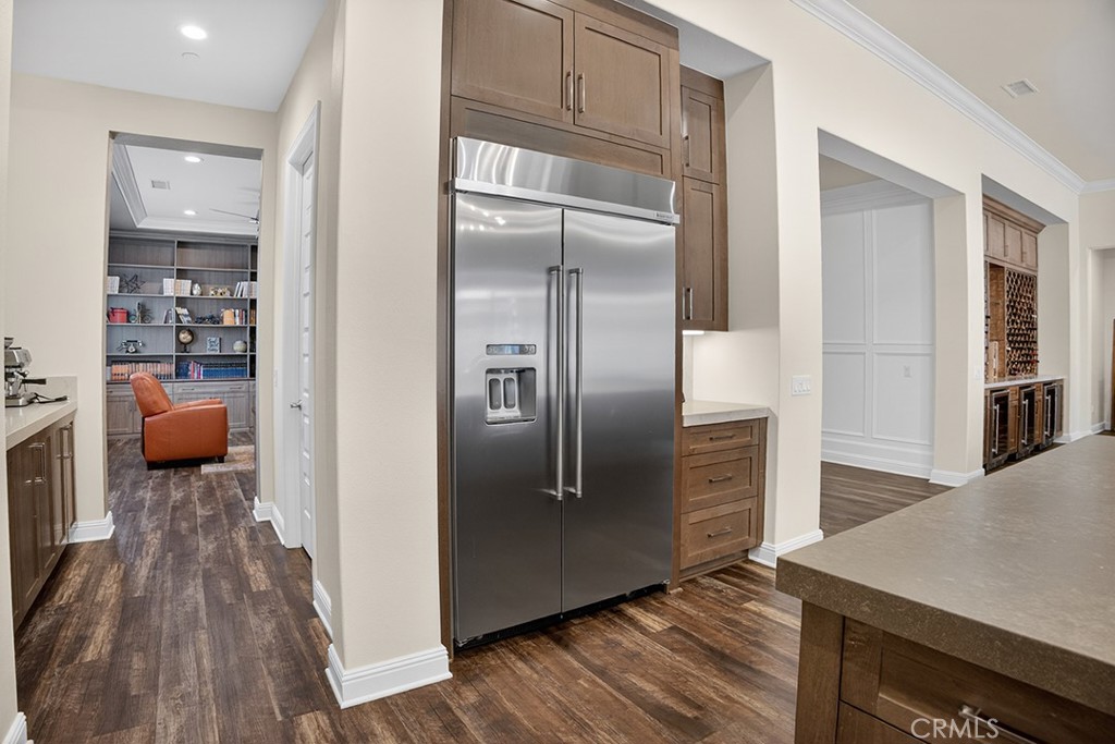 19843 Split Oak Road Chatsworth, CA 91311 - Photo 22 of 75 a kitchen with kitchen island a counter top space and stainless steel appliances