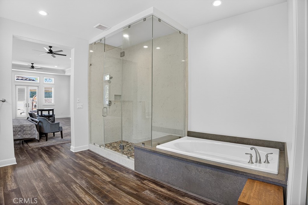 19843 Split Oak Road Chatsworth, CA 91311 - Photo 38 of 75 a spacious bathroom with a shower and a sink