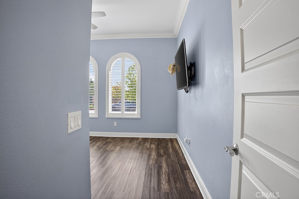 19843 Split Oak Road Chatsworth, CA 91311 - Photo 43 of 75 a view of a room with wooden floor staircase and windows