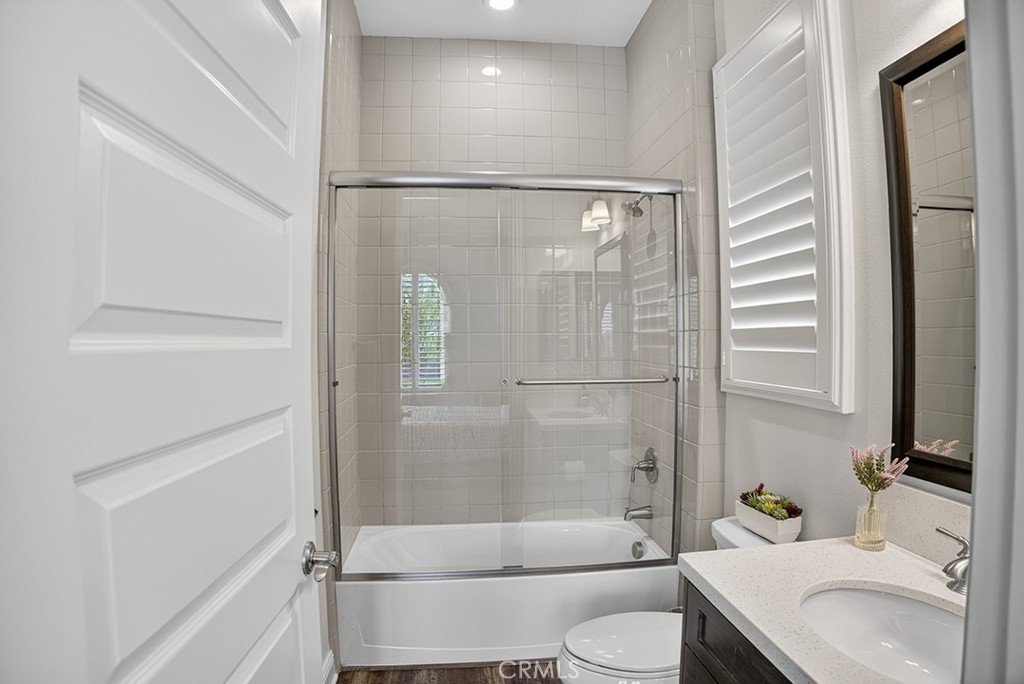 19843 Split Oak Road Chatsworth, CA 91311 - Photo 45 of 75 a bathroom with a sink toilet and shower