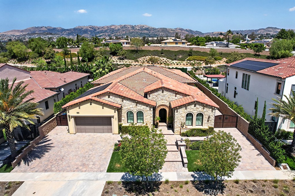 19843 Split Oak Road Chatsworth, CA 91311 - Photo 5 of 75 a aerial view of multiple houses with a yard